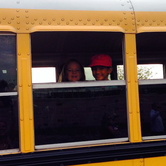 Waving from the Bus